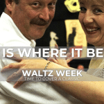 A smiling couple in a ballroom hold. Text overlaid says "This is where it begins", underneath "Waltz week" and then "Time to cover a classic" and then the Learn To Dance logo in the bottom right corner